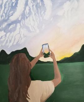 Girl captures mountain scene with her phone